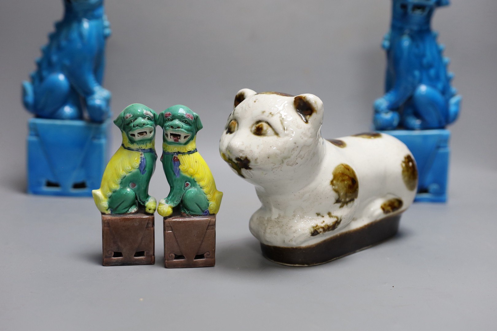 A pair of Chinese turquoise glazed lion dogs, 26.5cm, two Chinese dishes other Oriental ceramics etc.